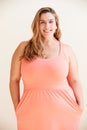 Studio Portrait Of Smiling Overweight Woman Royalty Free Stock Photo