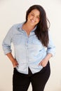 Studio Portrait Of Smiling Overweight Woman Royalty Free Stock Photo