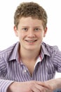 Studio Portrait of Smiling Teenage Boy