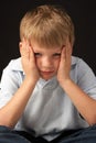 Studio Portrait Of Worried Boy Royalty Free Stock Photo