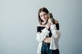 Studio Portrait of Young Adult Pretty Girl Hugs Her Little Pet Scottish Fold Cat Royalty Free Stock Photo