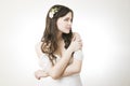 Studio portrait of a young beautiful bride in a white dress Royalty Free Stock Photo