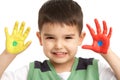 Studio Portrait Of Young Boy With Painted Hands Royalty Free Stock Photo