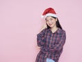 teenage girl wearing santa hat Royalty Free Stock Photo