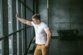 Studio portrait young men bodybuilder athlete, with a bare torso Royalty Free Stock Photo