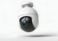 This is a studio product shot of a modern, white security camera. Royalty Free Stock Photo