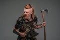 Combative viking with dual axes isolated on gray