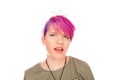 Young woman with pink hair having skeptical and suspicious look Royalty Free Stock Photo