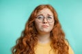 Upset and woman with her damaged dry hair face expression blue background Royalty Free Stock Photo