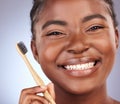 My smile is organic. Studio shot of a beautiful young woman brushing her teeth. Royalty Free Stock Photo