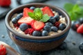 Studio shot of bowl of porridge with blueberries.