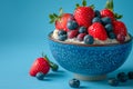 Studio shot of bowl of porridge with blueberries.