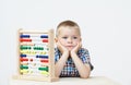 Studio Shot Of Boy Playing With Abacus Royalty Free Stock Photo