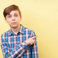 Studio shot of boy with surprised face expression Royalty Free Stock Photo