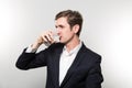 Studio shot of businessman with a glas of sparkling water