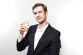 Studio shot of businessman with a glas of sparkling water