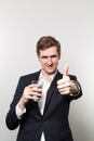 Studio shot of businessman with a glas of sparkling water