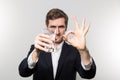 Studio shot of businessman with a glas of sparkling water Royalty Free Stock Photo