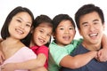 Studio Shot Of Chinese Family