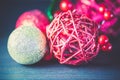 Studio shot of Christmas glittery decorations on a wooden table