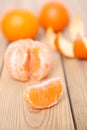 Citrus tankan against wooden background