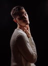 Studio shot of a handsome young male model wearing white T-shirt and sunglasses Royalty Free Stock Photo