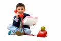 Studio shot of cute happy boy smiling while talking on old telep Royalty Free Stock Photo