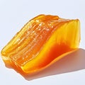 Close up of amber colored candy with visible texture and light Royalty Free Stock Photo