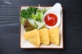 Fried cheese with tomato catsup