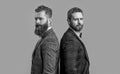 studio shot of gentlemen wearing tuxedo. elegant gentlemen in formal tuxedo suit.