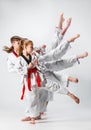 The studio shot of group of kids training karate martial arts