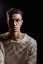 Studio shot of a handsome young male model wearing white T-shirt and sunglasses Royalty Free Stock Photo