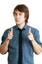Handsome young man pointing Royalty Free Stock Photo