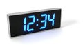 Isolated digital clock displaying the time 12:34 on a white background. Royalty Free Stock Photo