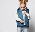 Girl unzip casual blue outwear sleeveless vest studio shot