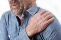 Studio Shot Of Man Suffering With Frozen Shoulder Royalty Free Stock Photo