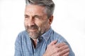 Studio Shot Of Man Suffering With Frozen Shoulder Royalty Free Stock Photo