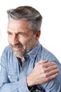 Studio Shot Of Man Suffering With Frozen Shoulder Royalty Free Stock Photo