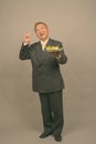 Portrait of mature Asian businessman with plate of salad Royalty Free Stock Photo