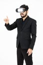 Studio shot of Millennial Asian smart professional successful businessman ceo entrepreneur wearing virtual reality VR goggles Royalty Free Stock Photo