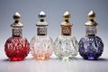 studio shot of perfume bottles with decorative caps Royalty Free Stock Photo