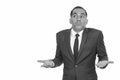 Mature Persian businessman shrugging shoulders in black and white Royalty Free Stock Photo