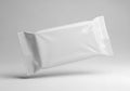 A blank white rectangular package floats against a soft gray background Royalty Free Stock Photo
