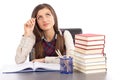 Studio shot of pretty schoolgirl making a hard decision Royalty Free Stock Photo