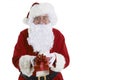 Studio Shot Of Santa Claus Holding Gift Wrapped Present Royalty Free Stock Photo