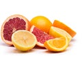 Citrus party. Studio shot of a selection of citrus fruits against a white background. Royalty Free Stock Photo