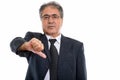 Studio shot of senior Persian businessman giving thumb down Royalty Free Stock Photo