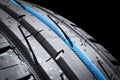 Car tire isolated on black background. Tire stack. Car tyre protector close up. Black rubber tire. Brand new car tires. Close up b Royalty Free Stock Photo