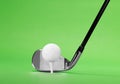 Golf Iron Club Head and Ball on a Green Background Royalty Free Stock Photo