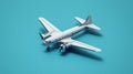 Studio shot of a silver propeller plane set against a blue background showcasing aviation design Royalty Free Stock Photo